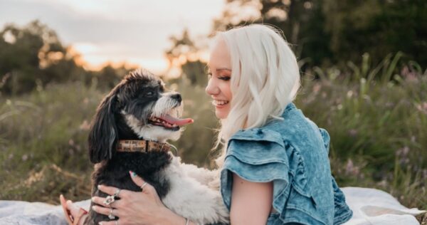 Stephanie with her dog. Photo credit to Amy Lino Photography.
